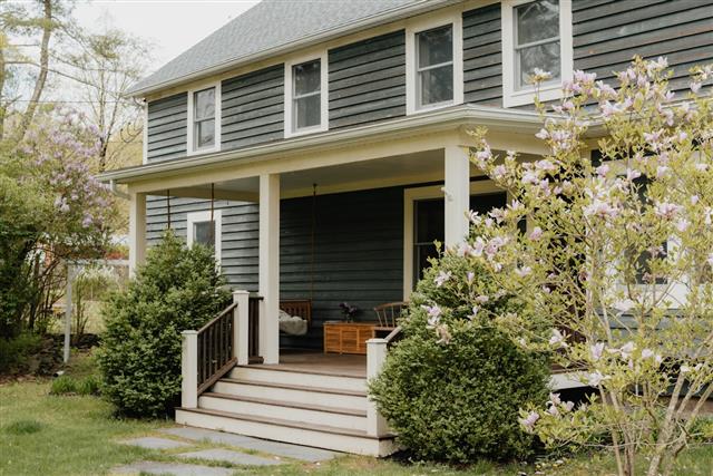 Country home with front porch and steps where falls often happen